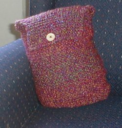 050202-pillowinchairsmall.jpg